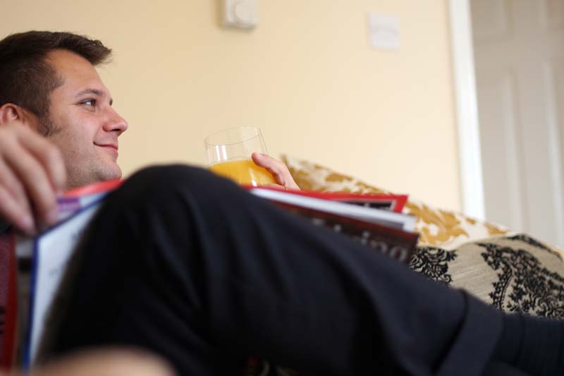 Businessman relaxing in one of apartments